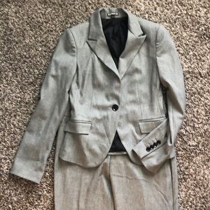 Black tweed pants and matching suit jacket.